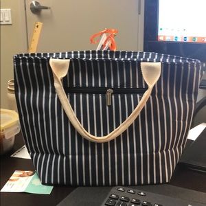 Insulated large capacity lunch tote/cooler.